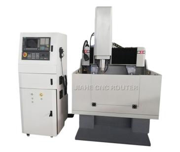 Macchina per incidere di stampi in metallo